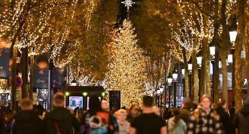 Christmas enthusiasts attend the Champs Elysees Christmas Lights Unveiling in Paris, on November 24, 2024. Photo by Firas Abdullah/ABACAPRESS.COM
