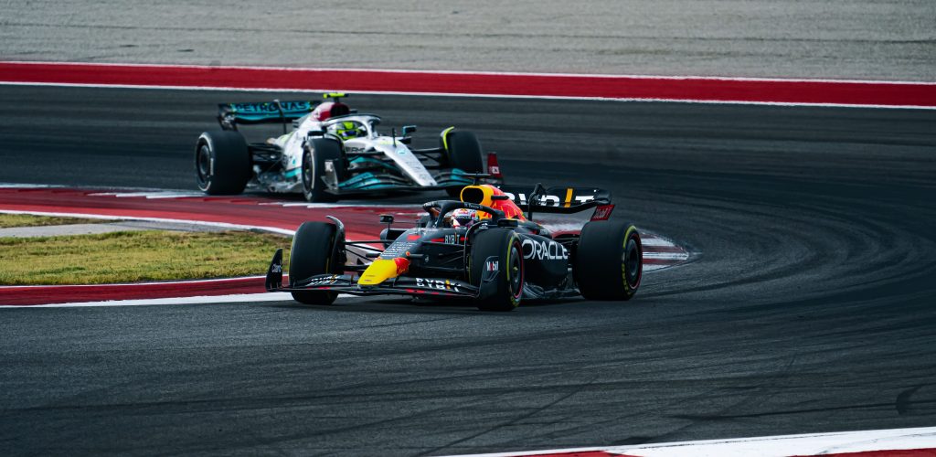 Competition between racing cars of Lewis Hamilton and Max Verstappen on the track at COTA USGP 2022