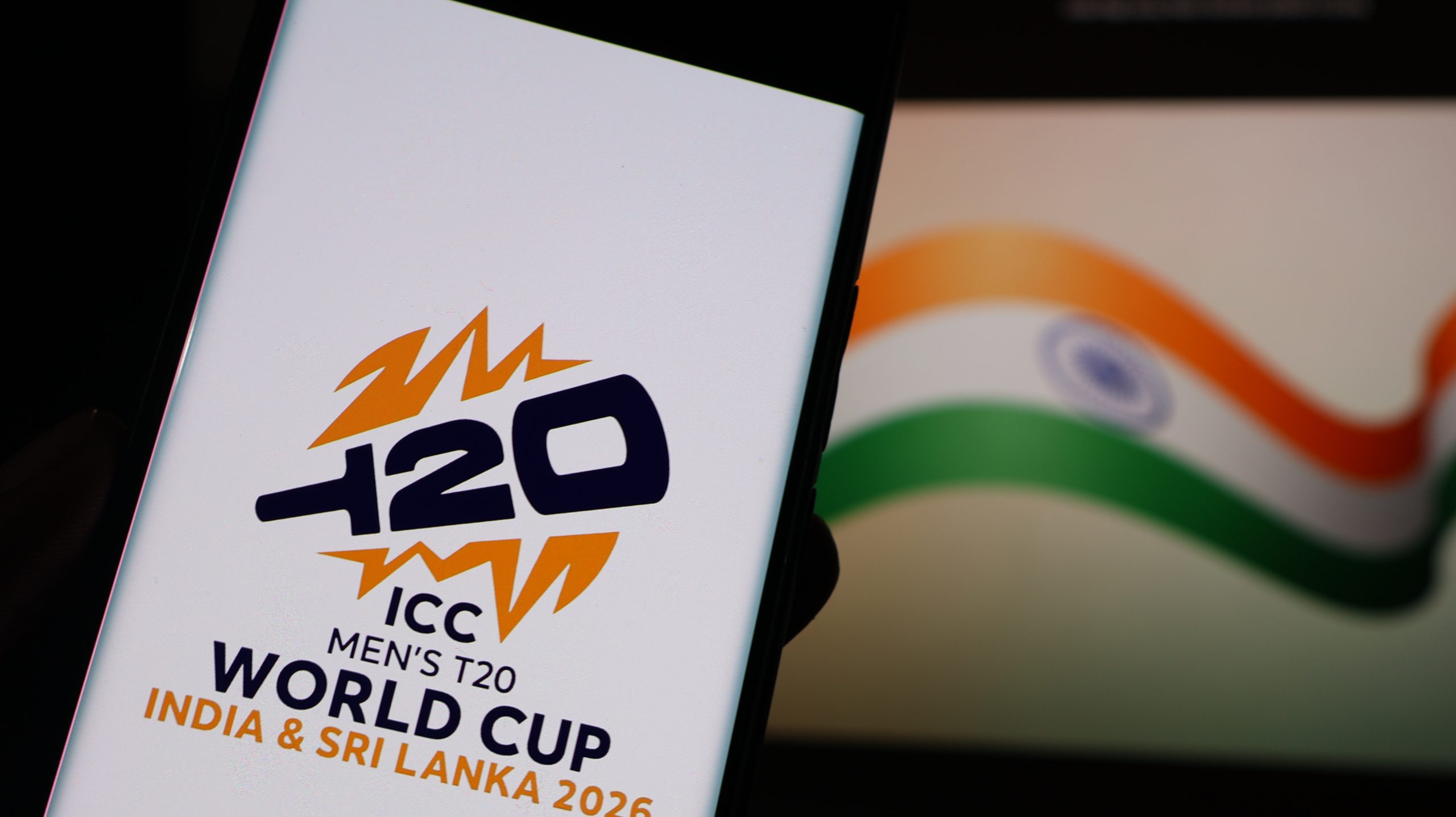 New Delhi, India - January 19 2026: ICC Men's T20 World Cup 2026 on smartphone with India flag background